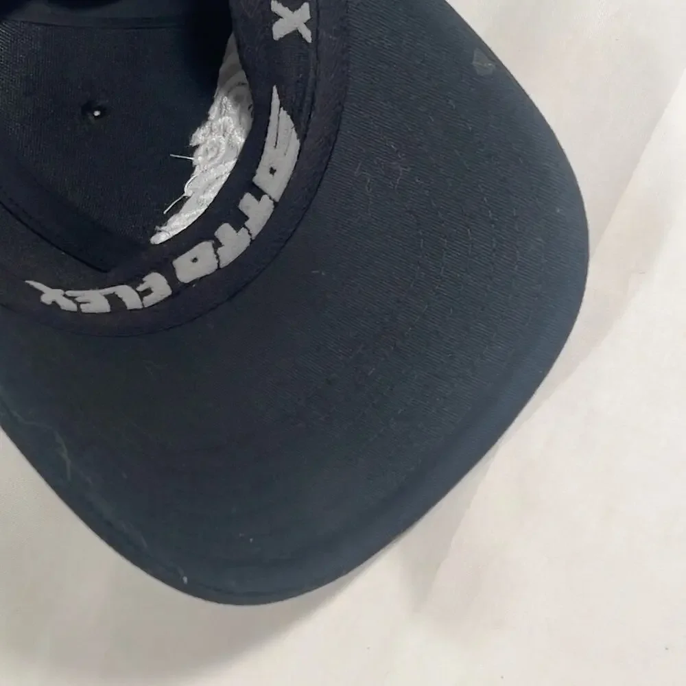 Hole in the Wall Black Flexible Fit L/XL Cap Embroidered White Logo OTTO Trucker